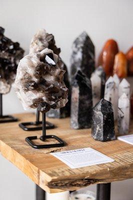 Gorgeous Smoky Quartz cluster on a metal stand.