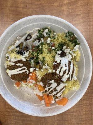 Falafel bowl with couscous (looked nicer but I tipped the bag when walking)