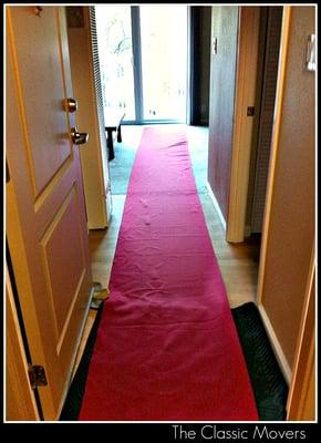 Red Carpet to Protect Floors.