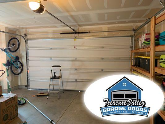 Broken Garage door spring replacement and new garage door opener installation in Kuna ID