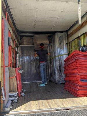 We ensure that all of your belongings are secured inside the truck. 
 P.S. Yes, we excel at Tetris :)