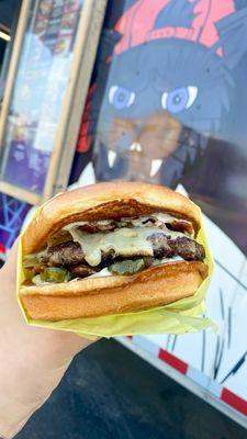 Last chance burger (Brioche Bun -6ozAll-Beef Patty -Herbed Aioli -PepperJack Cheese -bacon -Fresh Diced White Onion -Candied Jalapeños)