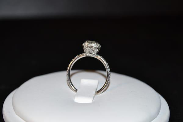 Cushion Cut Diamond set in a Halo setting with micro pave diamonds