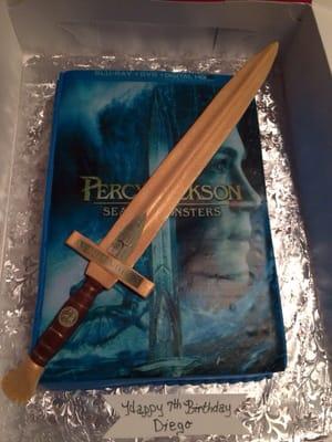 Fondant sword "Anaklusmos" and Percy cake made by Kim Arico.  Now that's talent!