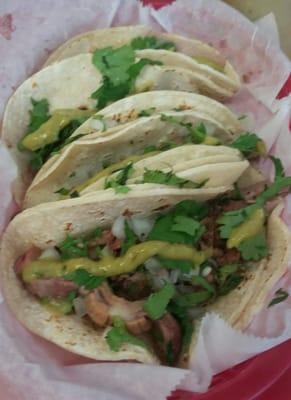 Tacos de lengua(cow tongue) with spicy green salsa