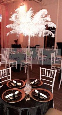 Hollywood Theme Birthday Celebration. 
Designed with ostrich feathers and clear vase.