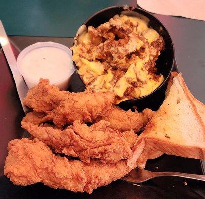 Chicken tenders and chili cheese fries