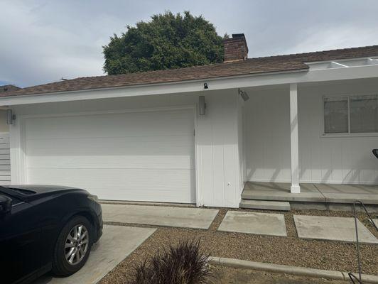 Painted garage door and porch