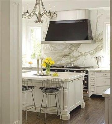 Custom kitchen, White Carrara marble, Thermador Range and hood.