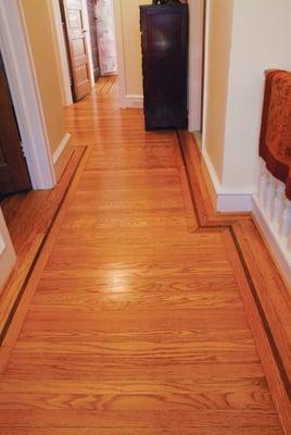 We sanded this 90-year-old Red Oak floor (900 square feet) with Walnut border and finished with semi-gloss water base finish.