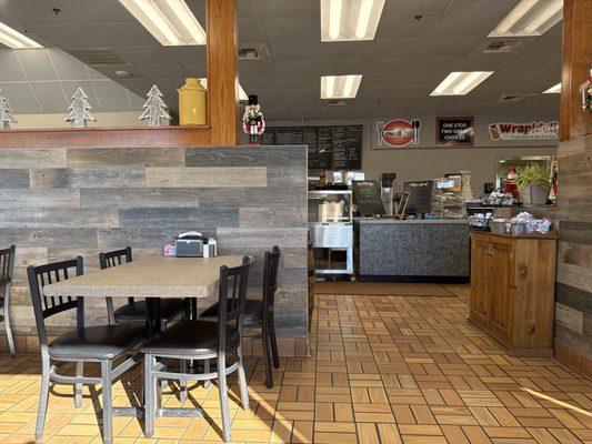 Inside the Restaurant facing the counter.