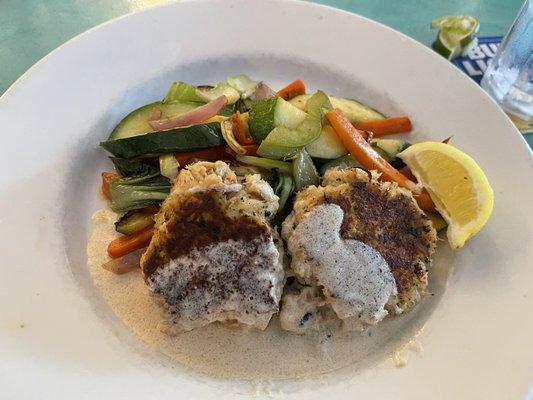 Crab cakes entree with citrus Beur Blanc sauce $34.95