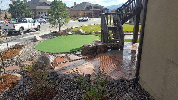 Side yard with putting green