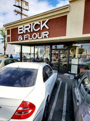 Brick & Flour is located on the corner/busy intersection of Victory Boulevard and Coldwater Canyon Avenue. Tight & narrow parking lot.