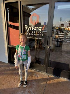 Leaving with a smile after having palatal expander placed at Synergi Ortho!