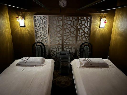 Room #3 with two brand new custom tables, fresh paint and upgraded lighting.  A private room also used for full body couples massage.