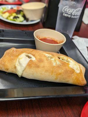 Sausage and pepperoni stromboli