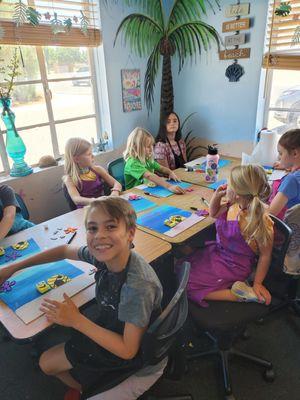 Canvas painting class.  The kids loved it!