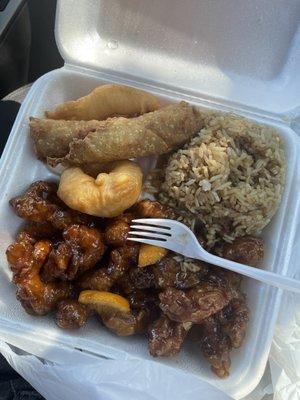 C12. Orange Chicken with fried rice and Egg Roll. i love that the chicken even came with fresh orange slices