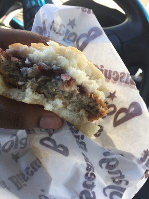 My hot and fresh steak biscuit already half eaten because I am so hungry.