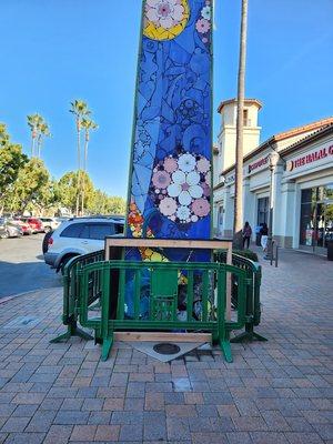 Cherry Orchard Shopping Center - car ran up onto sidewalk and hit the obelisk... destroyed a lamp post & damaged obelisk