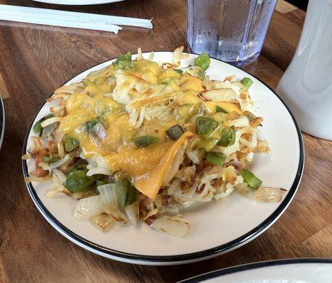 Hashbrowns with cheese, onions and peppers.