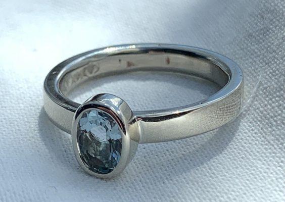 Fair trade white gold with aquamarine birthstone in a bezel setting.