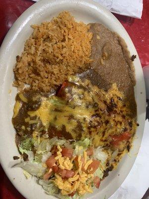 Beef enchiladas with rice and beans.