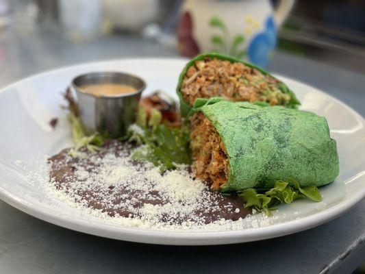 Breakfast burrito with Machaca and wedding sauce on the side