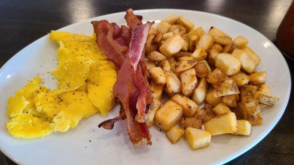 If you Order the German Dutch Baby Pancake, for $4 more you can order eggs, protein and potatoes.