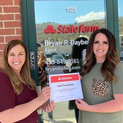 Danita Wright, Emily Johnson and the rest of the Bryan Daybell State Farm team proudly support the Utah Foodbank.