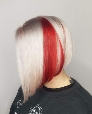 Platinum haircolor with bright red pop and bob haircut by Bethany