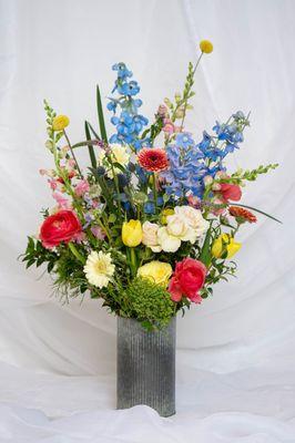 We source flowers from local growers in season!