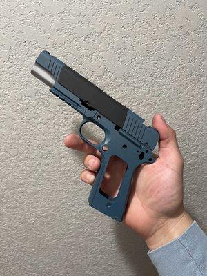 Custom Cerakote on This 1911 designed to look like a Star Trek blaster