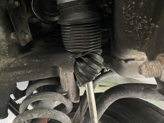 Mangled tie rod boot