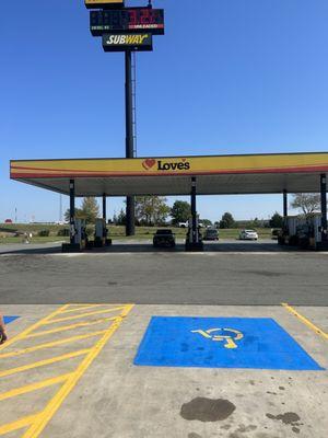 Gas station pump and handy cap parking