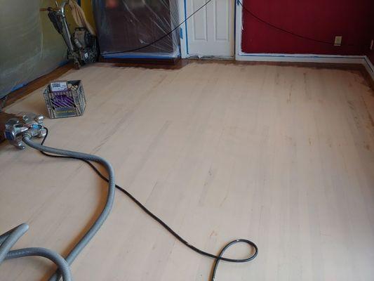 Floor filled with full trowel filler red oak water base to cover all cracks and holes