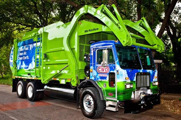 One of our beautiful new, environmentally-friendly CNG waste trucks!