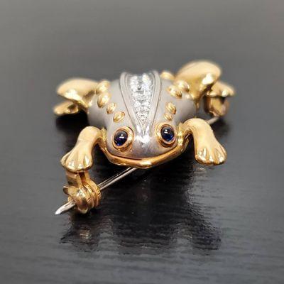 We buy unique vintage and estate jewelry like this 18k yellow gold and platinum frog. Set with natural diamond and sapphires for eyes.