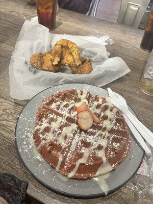 Boneless chicken breast and red velvet waffle.