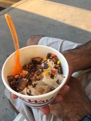 Yummy froyo! Toasted mashmello and salted caramel pretzel with Reese's cups and Reese's pieces for toppings