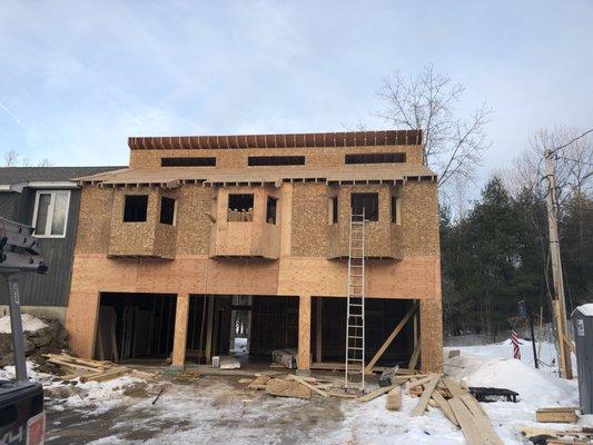 Addition, foundation to finish. 1400SF Garage for 5 cars with a half bath. 2 bedroom and 1 LUXURY master bedroom.