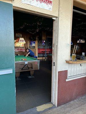 pool tables , pinball , table top shuffle board & back patio here