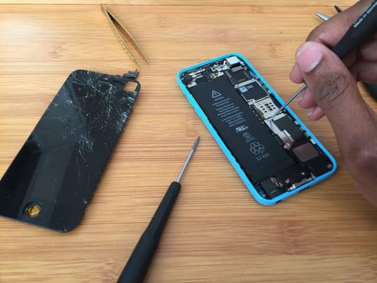 Fixing a broken iPhone 5c screen.