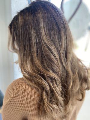 "Reverse Balayage" when you're looking to go from bright blonde to a more natural hue.