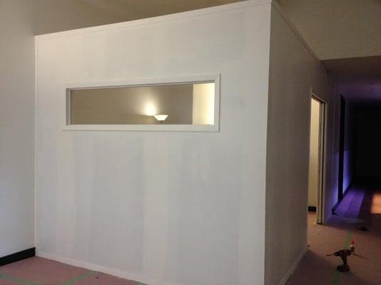 Free standing wall with a 20"x60" window.