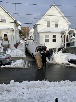 The delivery guy laughing at the situation