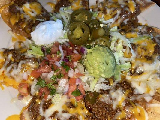 Ground beef nachos, full order, you will never regret ordering these.