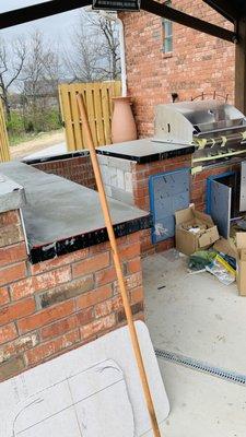 Outdoor kitchen with concrete countertops