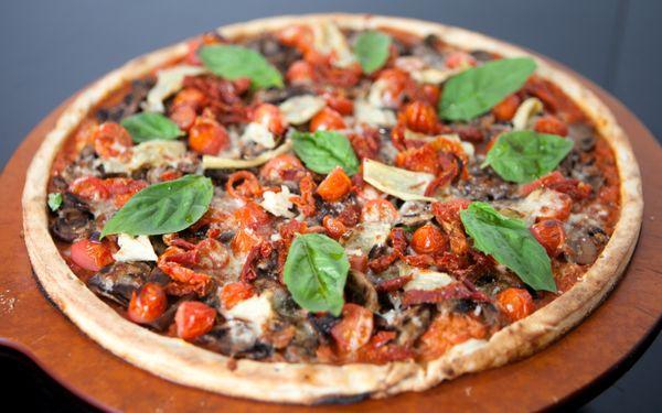 Veggie: Fresh tomato sauce, mozzarella, fresh mushrooms, artichoke hearts, cherry tomatoes, sun-dried tomatoes & fresh basil